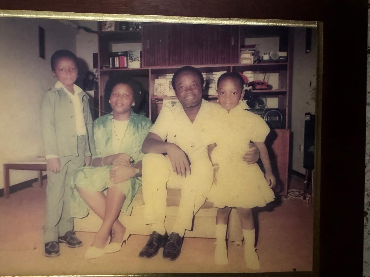 David with his wife and children at home