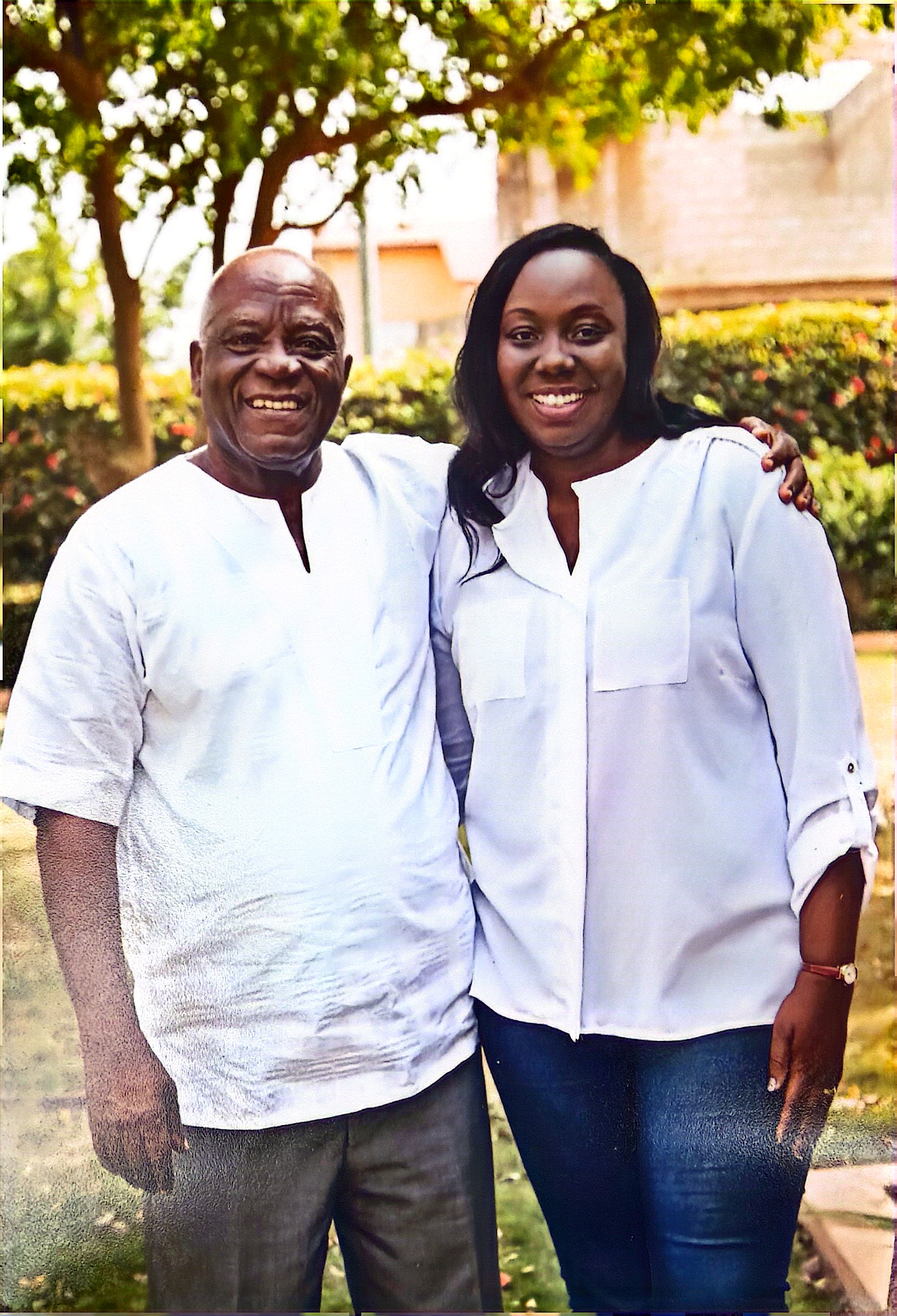 Abena with her father in the garden