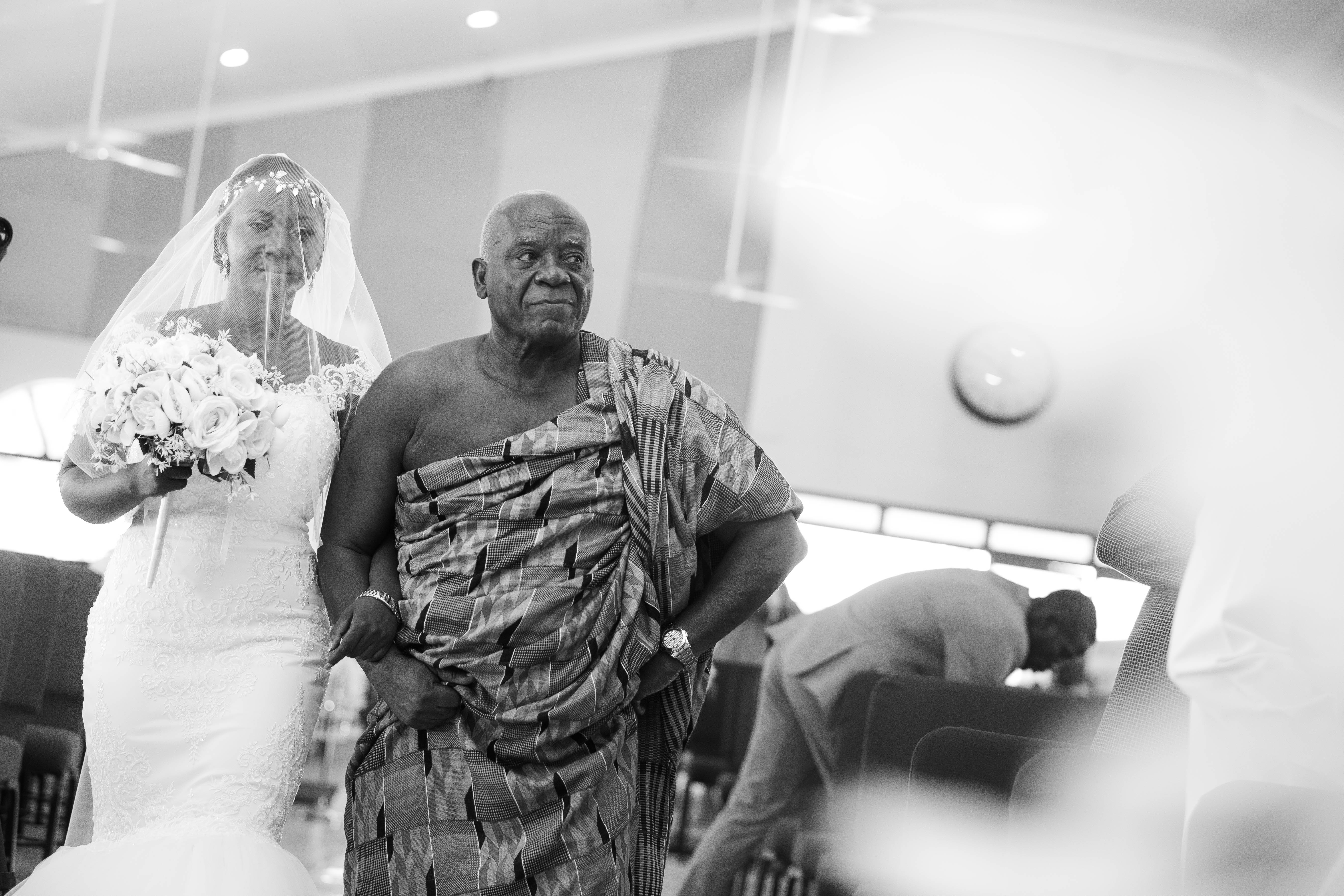 David walking Adwoa down the aisle on her wedding day